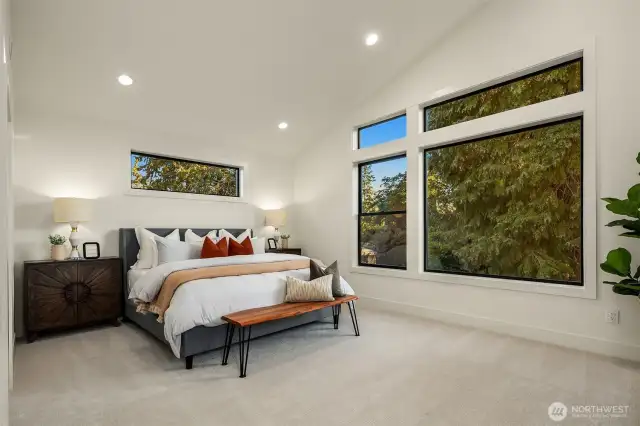 Designer primary suite with five-piece bath with heated floors