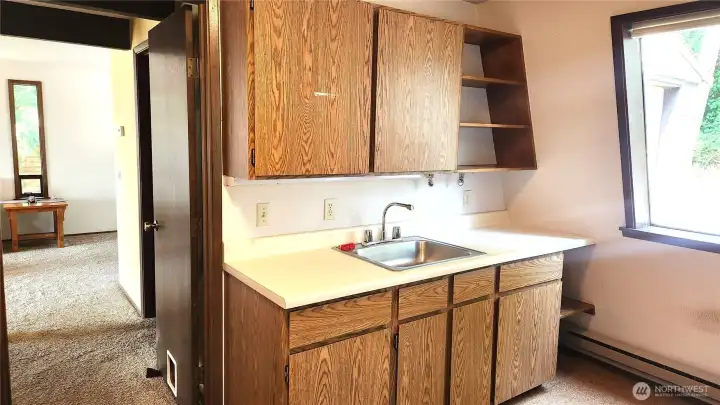 Utility room with sink