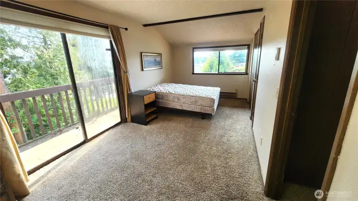 Larger upstairs bedroom with views and deck