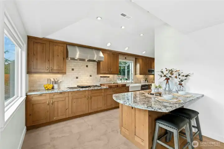Gorgeous granite breakfast bar will tempt you to linger with your toast and coffee.