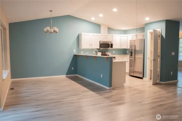 Welcome to the inviting dining area, a perfect space to enjoy delicious meals and good company. This charming setting promises a delightful dining experience every time you visit.