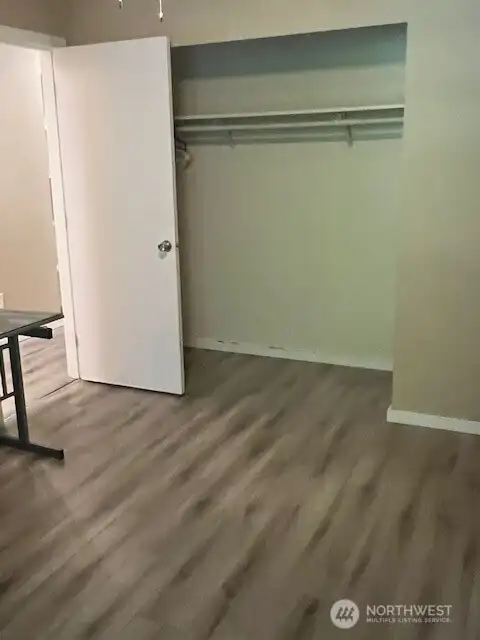 The third bedroom offers a generous space, perfect for comfort.