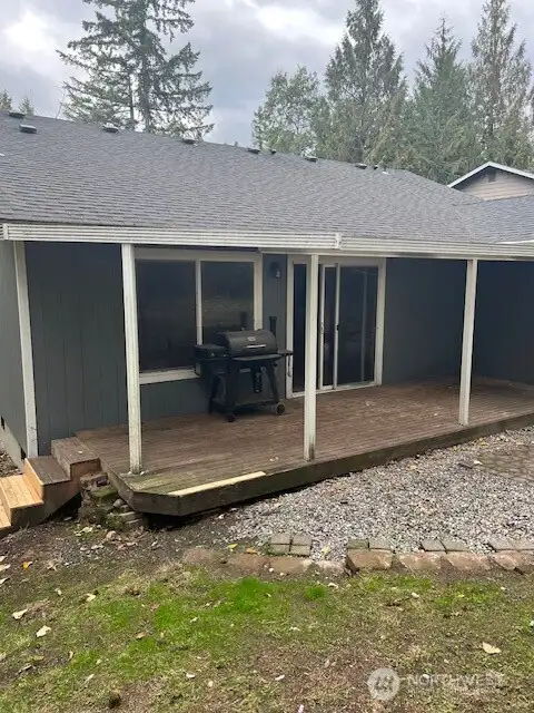Spacious backyard deck perfect for entertaining guests and enjoying outdoor gatherings.
