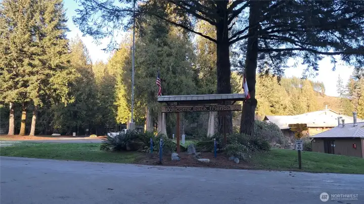 By main gate of community