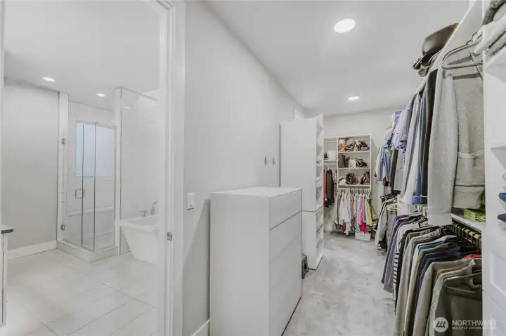 You'll love this enormous, fully customized walk-in closet.