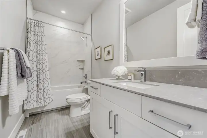 A beautiful full bathroom on the upper floor.