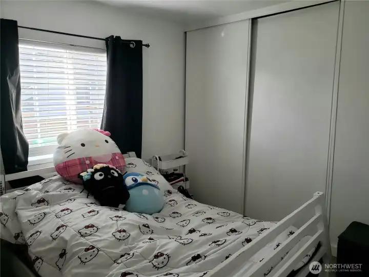 Good Sized Third Bedroom with Newer Paint, Trim, Vinyl Plank Flooring Showing Closet.