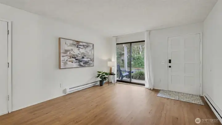 Convenient slider leads to private front patio.