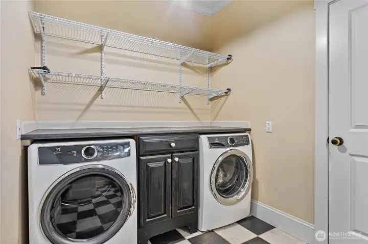 Ample laundry room off of garage