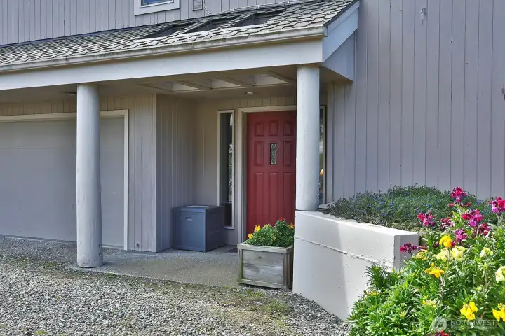 Front entry. EV charger plug-in located up here.