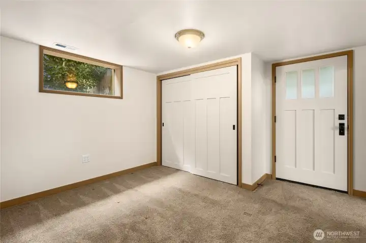 Lower second bedroom with access to the backyard