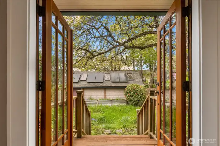 French doors lead to the private backyard.