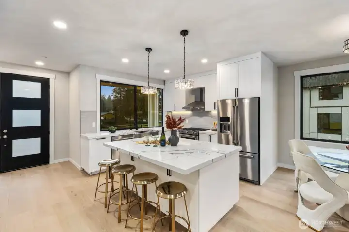 Secondary patio access enhances indoor-outdoor living.