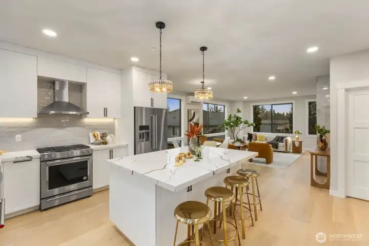 Gas oven with a spacious pantry conveniently located to the right.