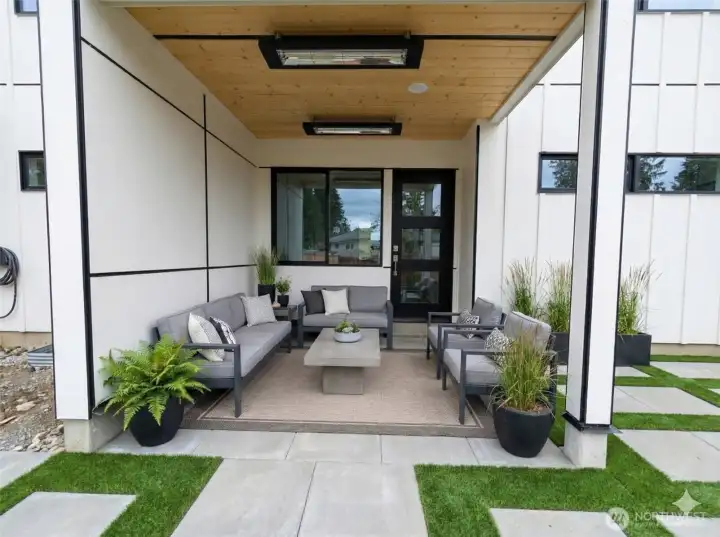 Low-maintenance turfed backyard with pavers; photo represents the finished design.