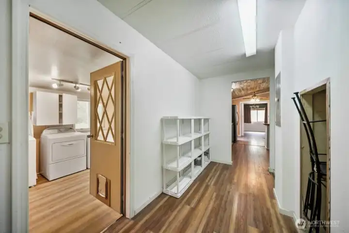 Pantry/storage from kitchen into utility room.