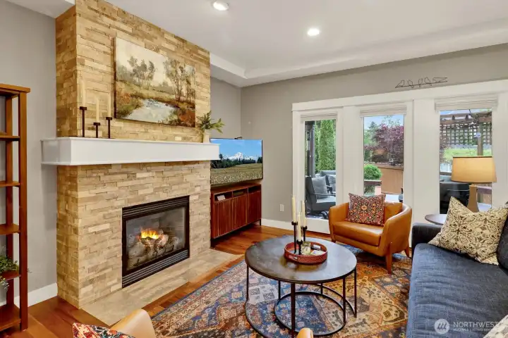 Warm and inviting living room with gas fireplace focal point