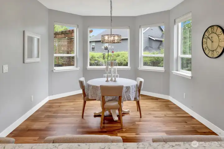 Dining area overlooking the backyard and outdoor living spaces