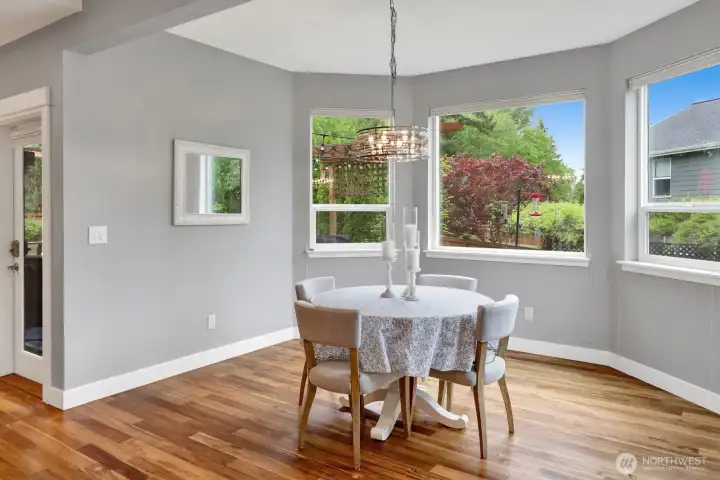 Dining nook with natural light and backyard views