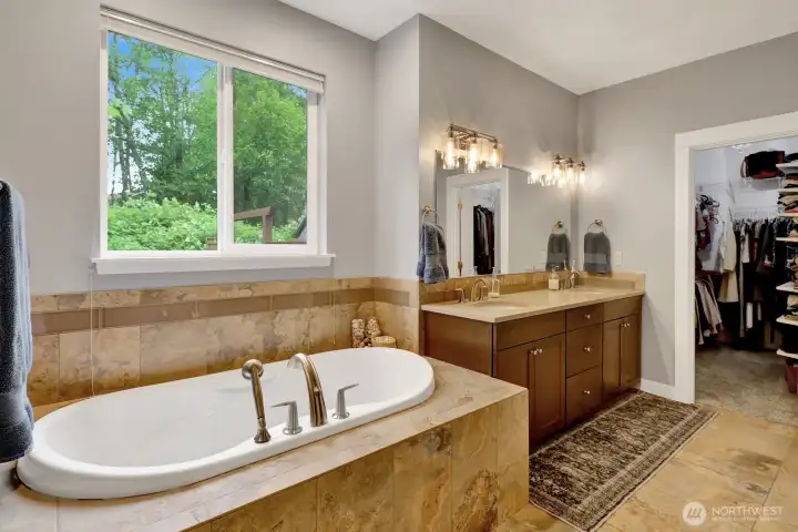 Relaxing soaking tub and bathroom detail