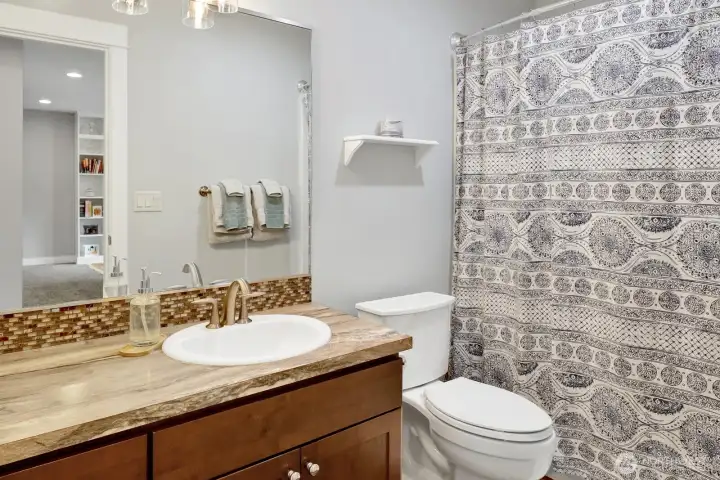Full bathroom serving upper level bedrooms and bonus space