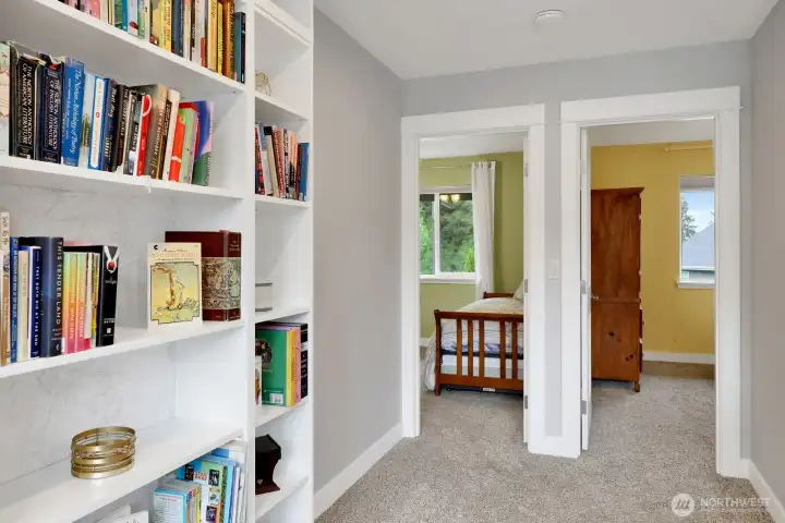 Custom built-in bookcases in upstairs bonus space