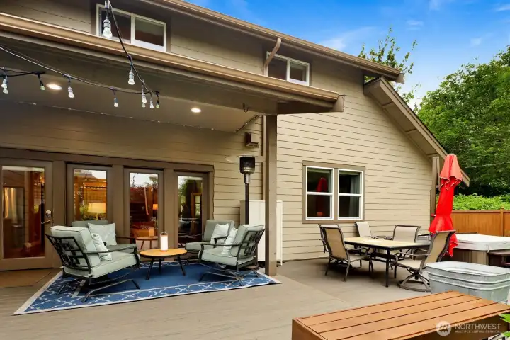 Partially covered outdoor living space designed for year-round enjoyment