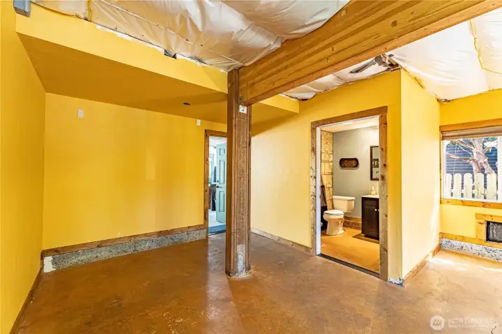 Unfinished lower level space with 3/4 bathroom and attached 2 car garage