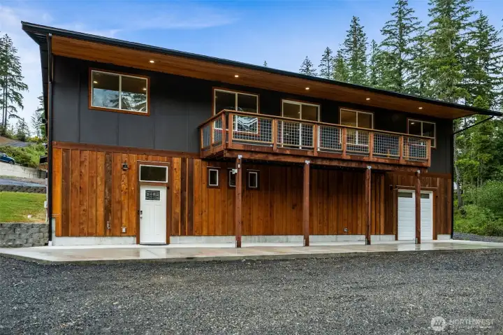 Back door, 30' deck, cedar siding, garage door Back door, 30' deck, cedar siding, garage door