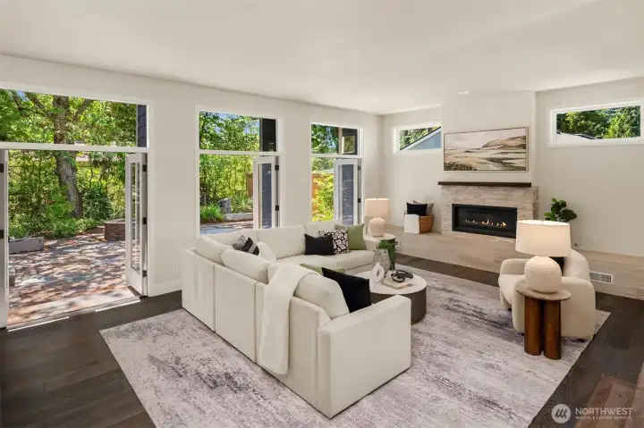 A triple-bank of French doors welcome the outdoors in.