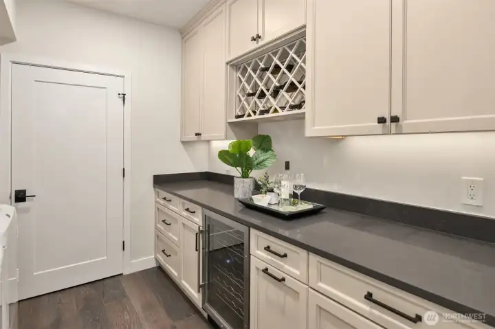 A fantastic butler's pantry space off the kitchen adds to your storage!