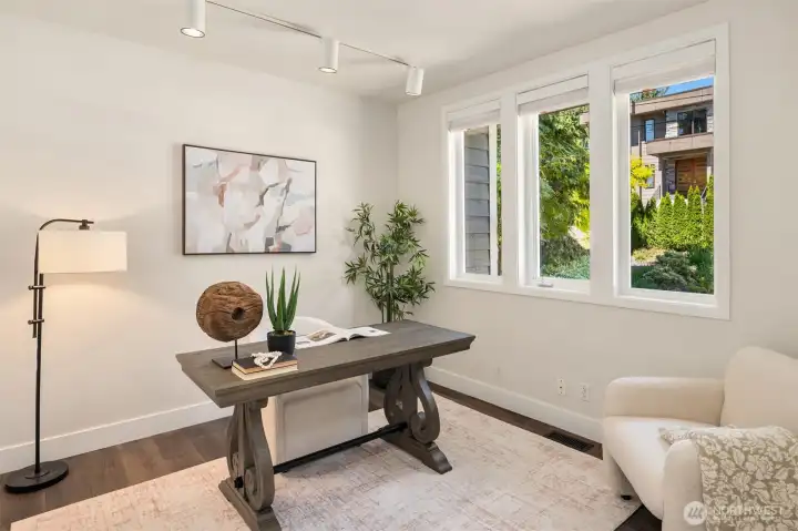 A spacious office off the foyer completes the main floor living space.