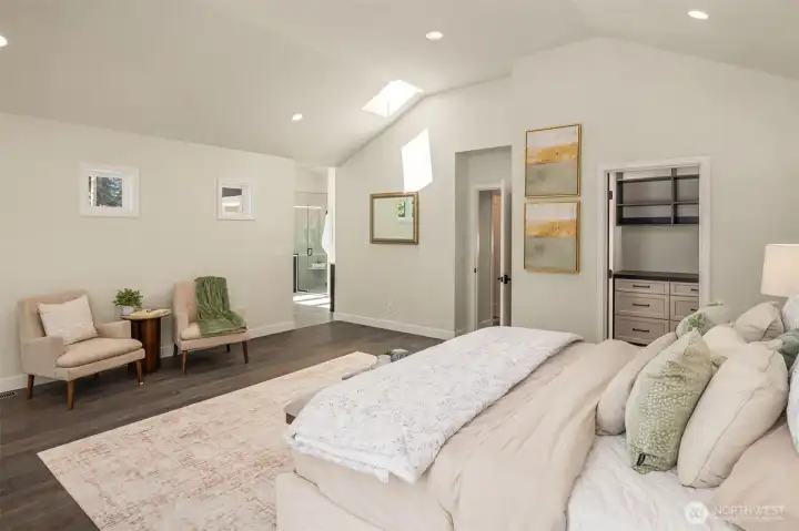 A walk-in closet and skylight complete the primary suite.