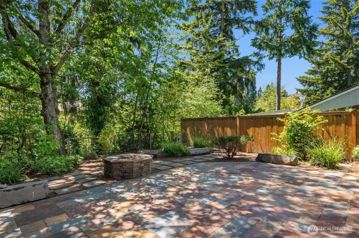 A water fountain and pond help create the perfect backyard oasis.