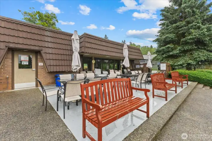 Outside the clubhouse is a great BBQ area with tables and chairs for all to enjoy.