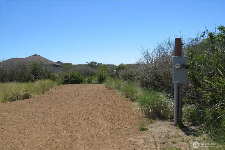 The North side of the property has water power and electric ready for your vacation vehicle!