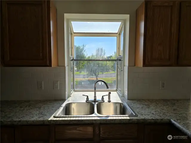 Bay window behind sink