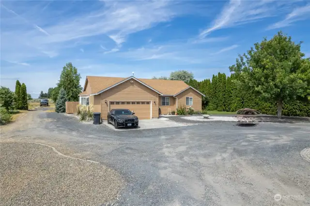 Gravel drive to the back portion of property