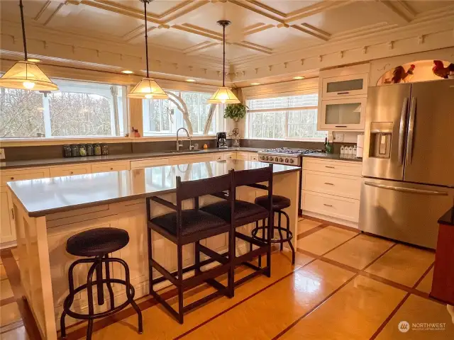 Chef kitchen with new appliances and amazing island design. Custom features abound. Easy to tell that the creator of this kitchen is also a master cabinet maker. So many hidden storage features!