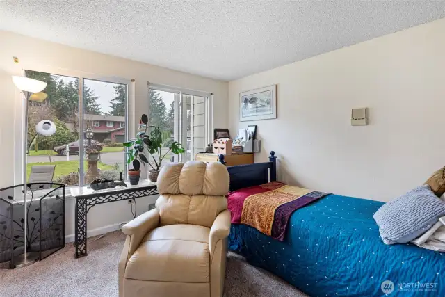 The main floor flex room would make a wonderful home office or cozy den.