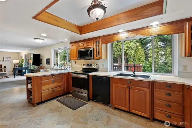 Kitchen with lush cabinetry and breakfast bar