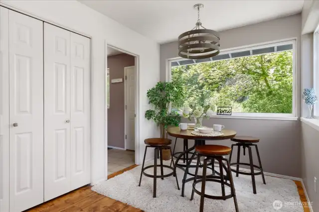 Little nook for dining - and pantry space behind those doors. Laundry is off to the left and door to back patio.