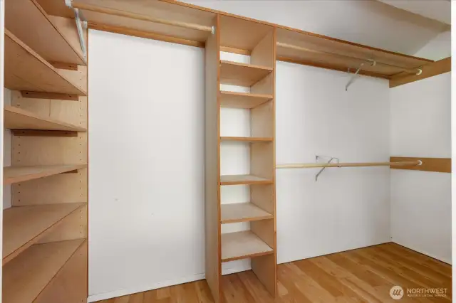 Primary suite walk-in closet with built ins!