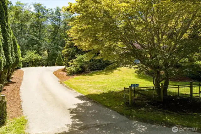 Lovely driveway entrance to your new Leroy Circle home.