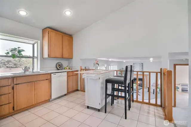 Kitchen w/ tile floor and nook space