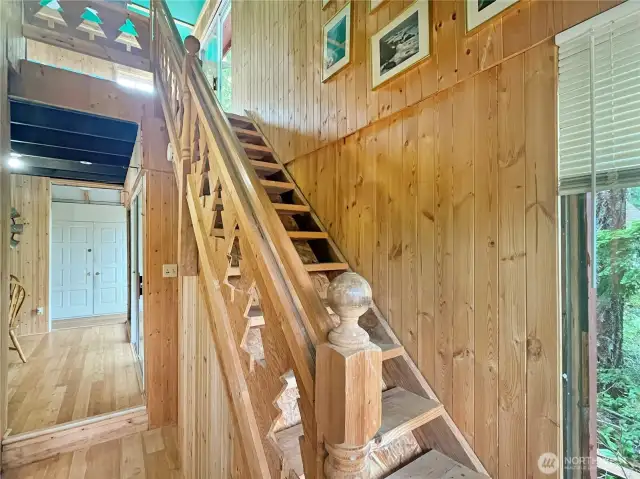 Tree cutouts lining the stairs give extra charm and character