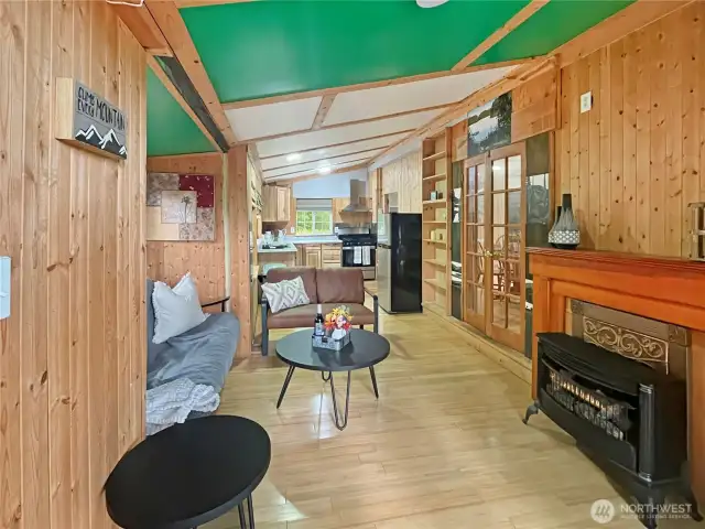 Kitchen flows into living space, perfect for entertaining.