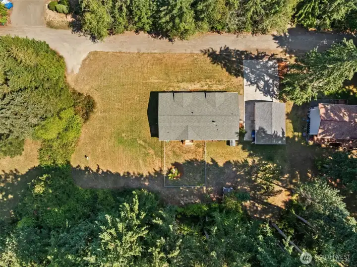 Spacious 1 Acre, Mostly Level with Gentle Slope in Front