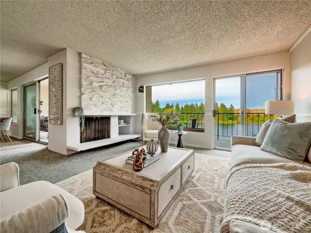 Sunlit living area seamlessly connected to the outdoors through expansive sliding doors showcasing panoramic views