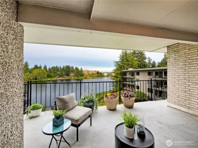 Your expansive balcony invites you to create lasting memories framed by the calm, reflective waters of your own lakefront.